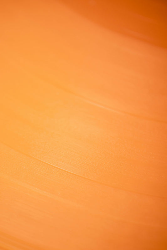Textura ámbar que evoca la miel cruda cristalizada