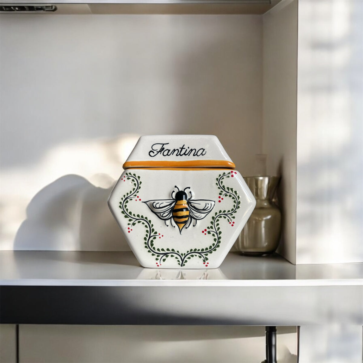 The Enredadera piece on a shelf, in window light — Fantina